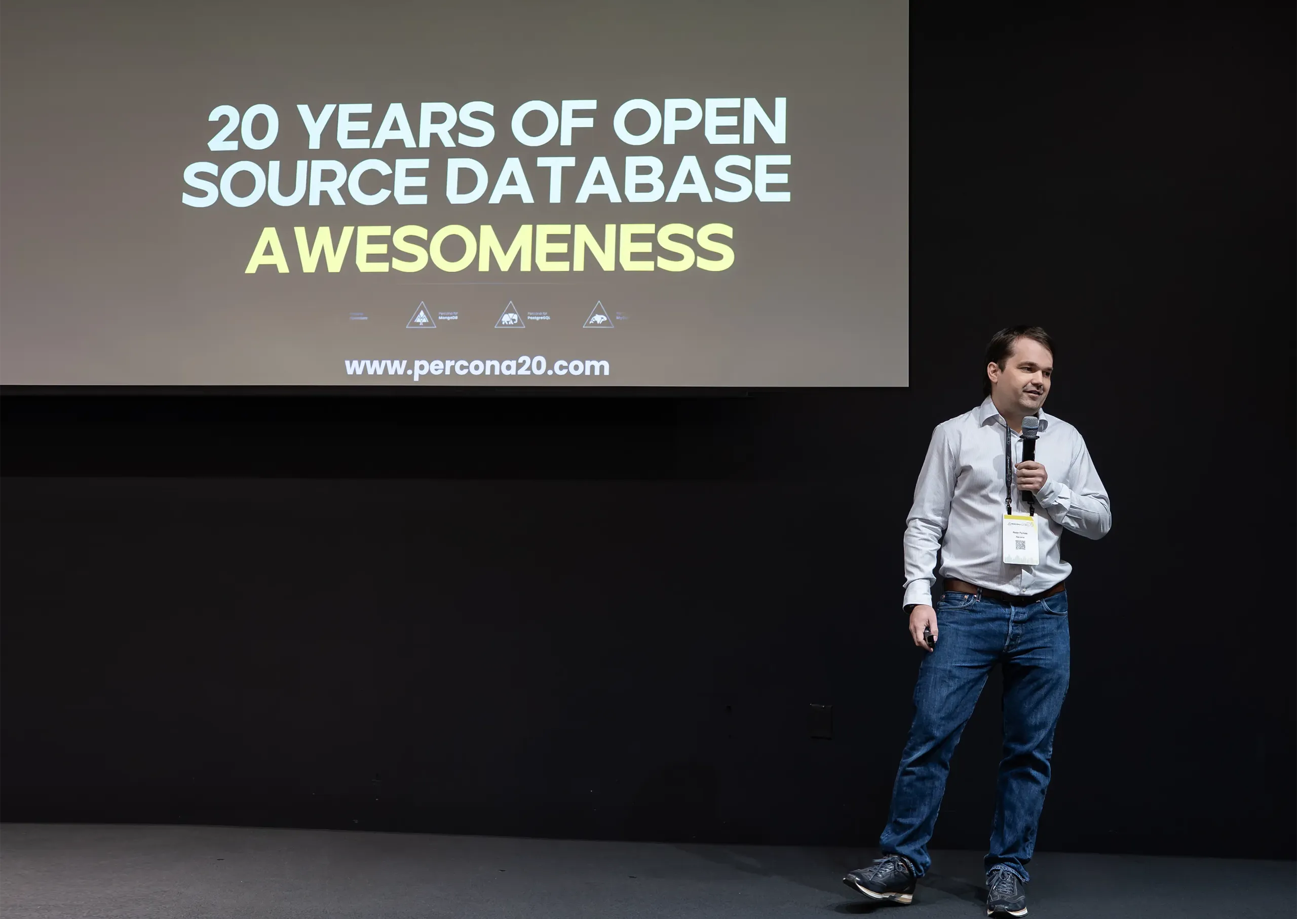 Speaker on stage at Percona Live